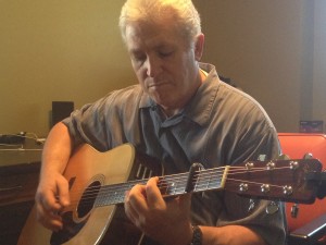 I snapped this last night when he picked up his guitar and started to sing.  He had no idea I was going to write about him today.  This time he wasn't singing a John Denver song.  He sang Amazing Grace -- something we are both recipients of.