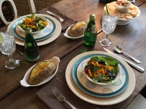 I'm a Goodwill shopper -- that's how I support my mismatch dish hobby.  Here is what I used: Service Plate/Charger – Homer Laughlin, restaurant (vintage unknown) Dinner Plate – Harkerware, Blue Mist (1950s) Salad Plate -- Noritake Ambience, Java Blue (not old, just a thrift find, 2005-2014) Cereal Bowl – Ironstone, unmarked (1970s) Oval Au Gratin/Potato Baker – Ironstone, unmarked (1980s) Crystal Water Goblet – Fostoria, Heritage (1979-1982) The old table is a two-board pine, circa 1860 -- the first piece of furniture we bought after we got married.