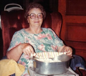 I couldn't find any photos of my Aunt Madge or the farm. (Still boxed up in mom's stuff.) But I found this one of Aunt Edna with her popcorn pan.  She was my dad's oldest sister but was more like a grandmother to me.  She was funny and kind and taught me to love popcorn as much as she did.